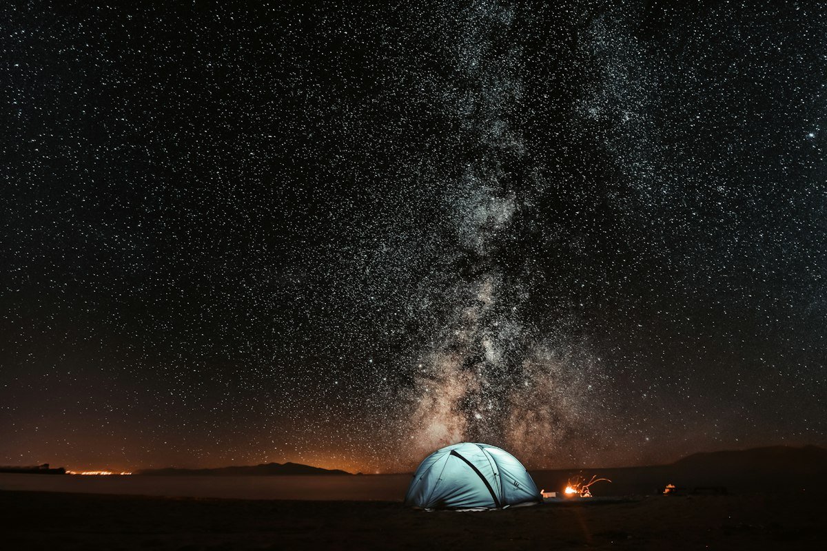Campfire under stars
